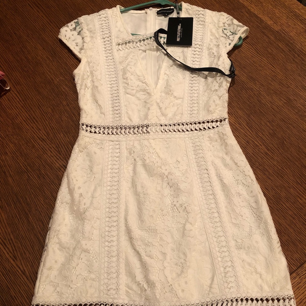 Never been worn, Little White Dress!
